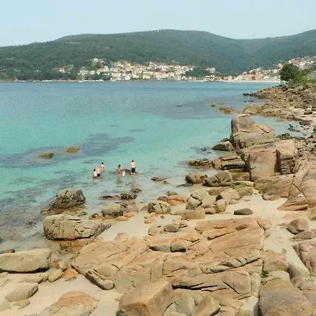 Casita Con Terraza Al Lado Del Mar En O Pindo Hébergement de vacances