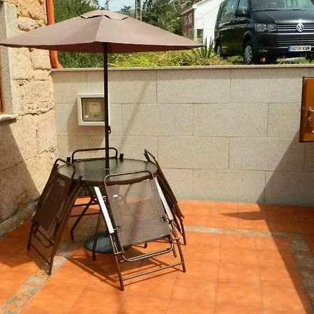 Casita Con Terraza Al Lado Del Mar En O Pindo Hébergement de vacances *